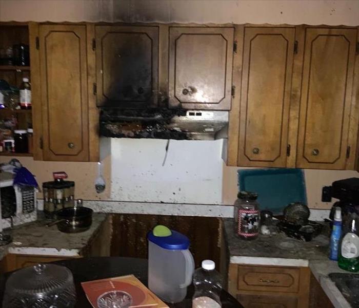 Soot and smoke damage to kitchen cabinets and items