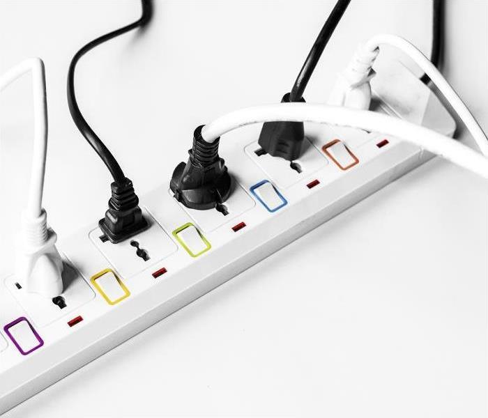 Power strip filled with plugs