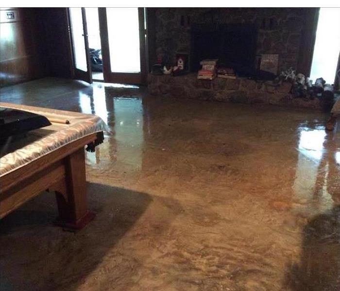 Standing water in living room area